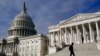 A man walks past the the U.S. Capitol, in Washington, Oct. 27, 2021.