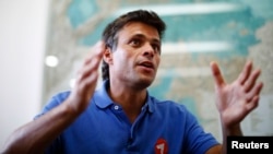 FILE - Venezuelan opposition leader Leopoldo Lopez speaks during an interview in Caracas, Feb. 11, 2014.