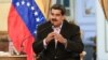 Venezuela's President Nicolas Maduro speaks during a meeting with members of the Venezuelan diplomatic corp after their arrival from the United States, at the Miraflores Palace in Caracas, Venezuela Jan. 28, 2019. 