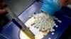 FILE - A prescription is filled at a pharmacy in Sacramento, Calif. A plan being discussed in Congress would give Medicare officials the ability to negotiate pricing on a sliver of the thousands of prescription medications on the market in the United States.