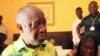 Gbagbo and his wife Simone sit in a room at Hotel Golf in Abidjan, after they were arrested, April 11, 2011. 
