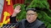 This picture taken during the period of Dec. 28-31, 2019, and released Jan. 1, 2020, shows North Korean leader Kim Jong Un attending a session of the 5th Plenary Meeting of the 7th Central Committee of the Workers' Party of Korea.