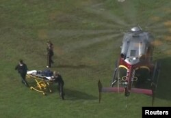 Rescue workers unload a stretcher from a helicopter following a shooting incident at the municipal center in this still image from video in Virginia Beach, Virginia, May 31, 2019.
