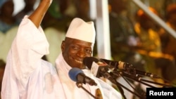 FILE - Gambia's President Yahya Jammeh, who is also a presidential candidate for the Alliance for Patriotic Re-orientation and Construction (APRC), smiles during a rally in Banjul, Gambia, Nov. 29, 2016. 