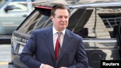 FILE - Former Trump campaign manager Paul Manafort arrives for arraignment on charges of witness tampering, at U.S. District Court in Washington, June 15, 2018.