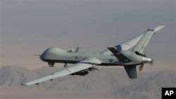 FILE - A Reaper drone patrols the skies in southern Afghanistan near the frontier with Pakistan.