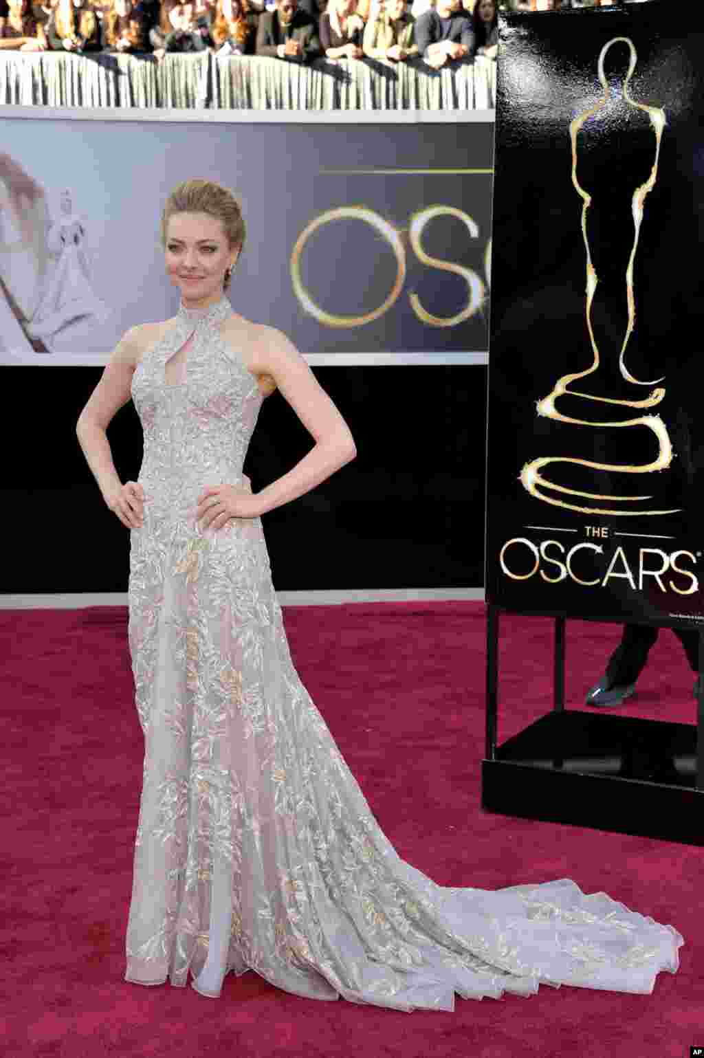 Actress Amanda Seyfried arrives at the 85th Academy Awards at the Dolby Theatre, Feb. 24, 2013, in Los Angeles.