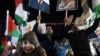 Palestinians celebrate during a rally in the West Bank city of Ramallah, November 29, 2012.