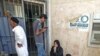 Libyans waits outside a branch of the North Africa Bank to get 250 Libyan dinars ($200) at the Souk al-Djoumaa district in Tripoli, Libya, August 2011. (file photo)