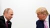 El presidente de EE.UU., Donald Trump, y su homólogo ruso, Vladimir Putin, durante un encuentro del G20 celebrado en Osaka, Japón, el 28 de junio de 2019.