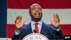 (FILES) US Senator and 2024 Republican Presidential hopeful Tim Scott speaks at the Republican Party of Iowa's 2023 Lincoln Dinner at the Iowa Events Center in Des Moines, Iowa, on July 28, 2023.