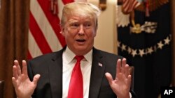Prezidan ameriken an Donald Trump pandan li tap pale nan Lamezon Blanch jedi 24 janvye 2019 la. Washington. (Foto: AP/Jacquelyn Martin)