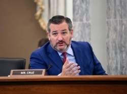 FILE - Sen. Ted Cruz, R-Texas, asks a question on Capitol Hill in Washington, June 24, 2020.