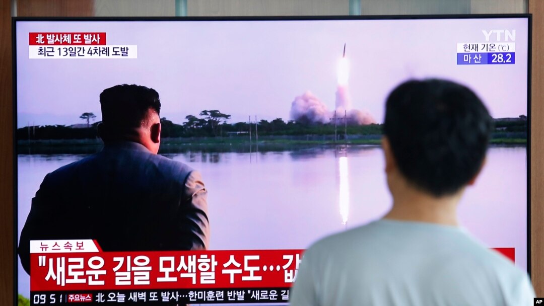 A man watches a TV showing a file image of a North Korea's missile launch during a news program at the Seoul Railway Station in Seoul, South Korea, Tuesday, Aug. 6, 2019. North Korea on Tuesday continued to ramp up its weapons demonstrations by…
