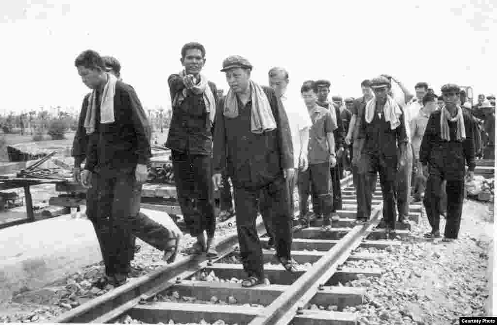 Ieng Sary on a 1977 railroad inspection tour with Chinese advisers. (Documentation Center of Cambodia Archive)