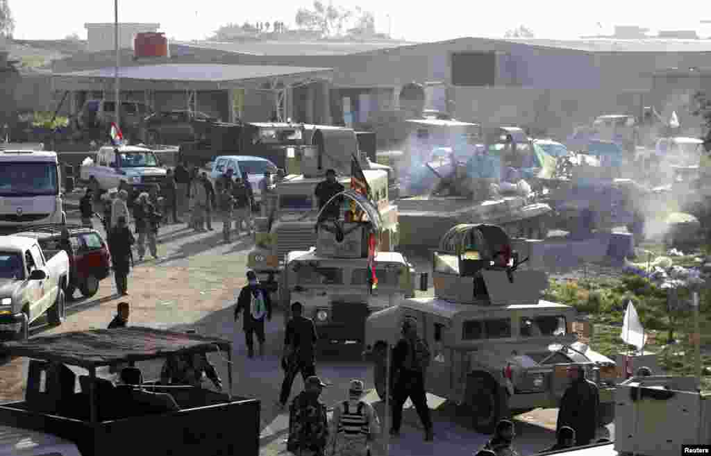 Lực lượng an ninh Iraq và Shia đụng độ với các tay súng Nhà Nước Hồi Giáo trong tỉnh Saladin, ngày 2/2/2015.