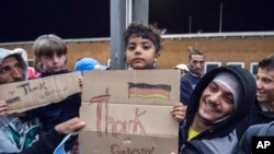 Refugiados llegan a una estación de trenes en Saalfeld, Alemania, el 5 de septiembre de 2015.