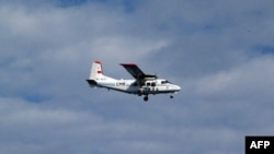 日本海岸警衛隊發佈的中國一架飛機於去年12月13日在有爭議的尖閣諸島上空飛行