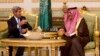 U.S. Secretary of State John Kerry, left, talks with Saudi Foreign Minister Prince Saud Al-Faisal bin Abdulaziz al-Saud, after Kerry arrived in Riyadh, Saudi Arabia, Nov. 3, 2013. 