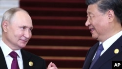 Президент Росії Владімір Путін та лідери Китаю Сі Цзіньпін, Пекін, 17 жовтня 2023. Sergey Savostyanov, Sputnik, Kremlin Pool Photo via AP