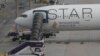 Passengers, crew arrive in Singapore hours after turbulence-stricken flight 