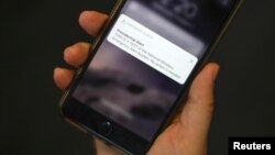 Test poruka sa predsedničkim upozorenjem na mobilnom telefonu u Njujorku, 3. oktobra 2018. 