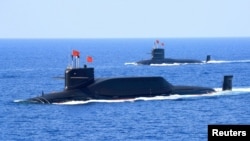 資料照：中國海軍094A晉級彈道導彈戰略核潛艇在南中國海參加軍事表演。 （2018年4月12日）