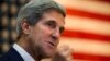 FILE - U.S. Secretary of State John Kerry gestures while speaking to U.S. Embassy staff during a break in an extended meeting with Afghan President Hamid Karzai in Kabul.