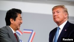 美国总统特朗普和日本首相安倍晋三8月25日在7国集团峰会间隙举行会谈。