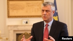 FILE - Kosovo's President Hashim Thaci gives an interview for Reuters in his office in Kosovo's capital Pristina, Jan. 16, 2017.