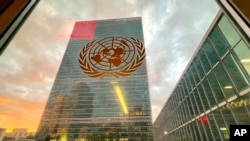 FILE - The United Nations headquarters building is seen from inside the General Assembly hall, during the 76th Session of the U.N. General Assembly in New York, Sept. 21, 2021. 