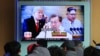 FILE - People watch a TV screen showing images of North Korean leader Kim Jong Un, right, South Korean President Moon Jae-in, center, and U.S. President Donald Trump at the Seoul Railway Station in Seoul, South Korea, March 7, 2018.