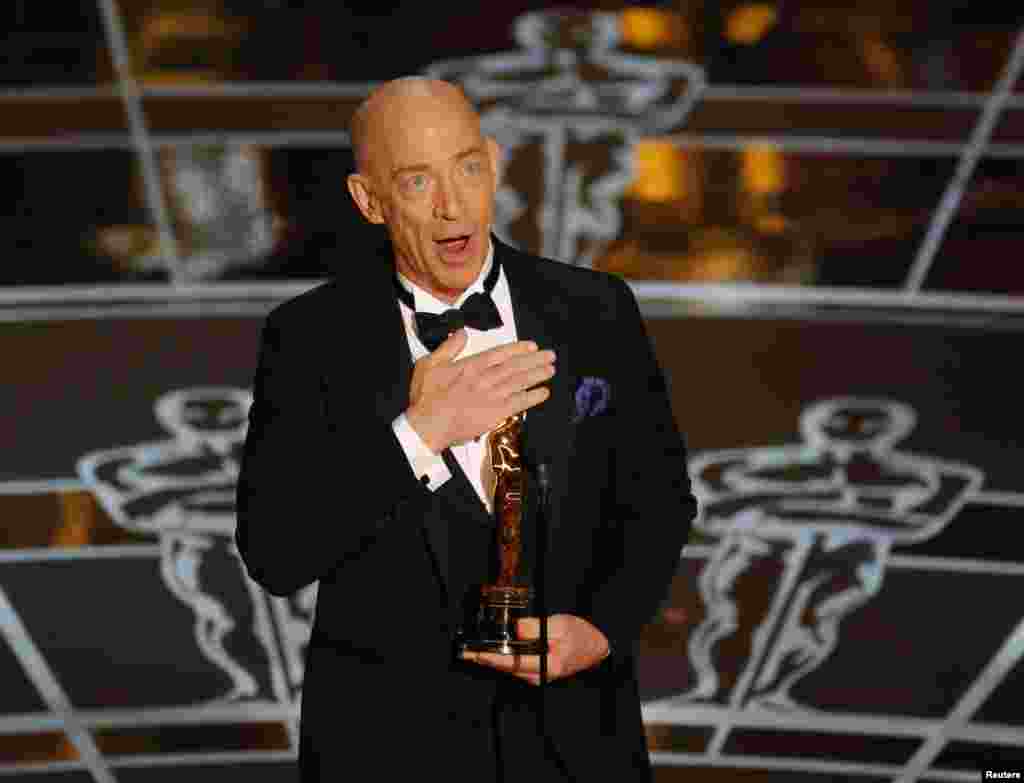 J.K. Simmons receives the Oscar for actor in a supporting role for "Whiplash" at the 87th Academy Awards in Hollywood, California, Feb. 22, 2015.