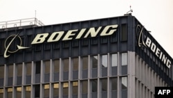 FILE - The Boeing Co. logo is displayed outside of company offices near Los Angeles International Airport in El Segundo, California on Jan. 18, 2024.