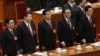 中共十八大闭幕式上的政协主席贾庆林（中）和中纪委书记贺国强（左）、国家副主席习近平、人大委员长吴邦国、国家主席胡锦涛