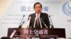 同中国民政部长李立国交谈的日本国土交通大臣太田昭宏，图为太田昭宏2013年在记者会上