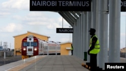 A train launched to operate on the SGR line constructed by the China Road and Bridge Corporation and financed by Chinese government arrives at the Nairobi Terminus on the outskirts of Kenya's capital Nairobi, May 31, 2017.